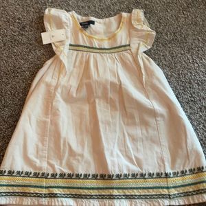 Baby gap dress- never worn NWT. Bloomers and headband attached. 18-24 m.